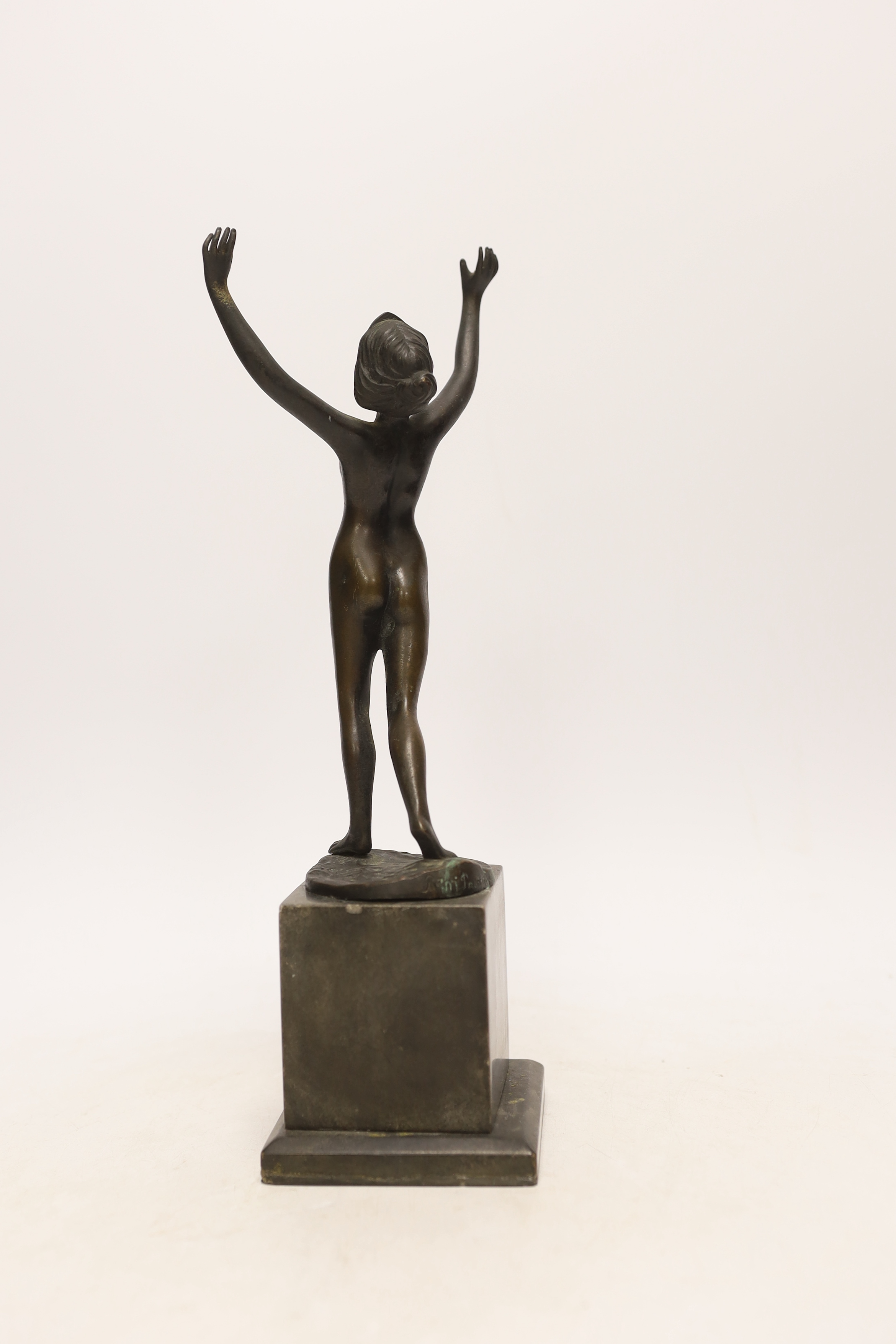Remi Palmier (19th/20th. C), an Art Deco bronze of a nude lady, raised on square pedestal base, signed, 30cm high